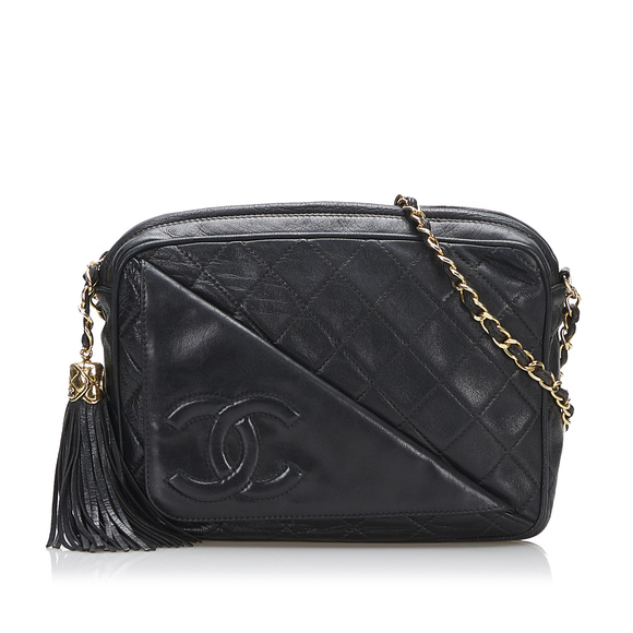 CHANEL Handbags - CHANEL CC Quilted Tassel Crossbody Bag